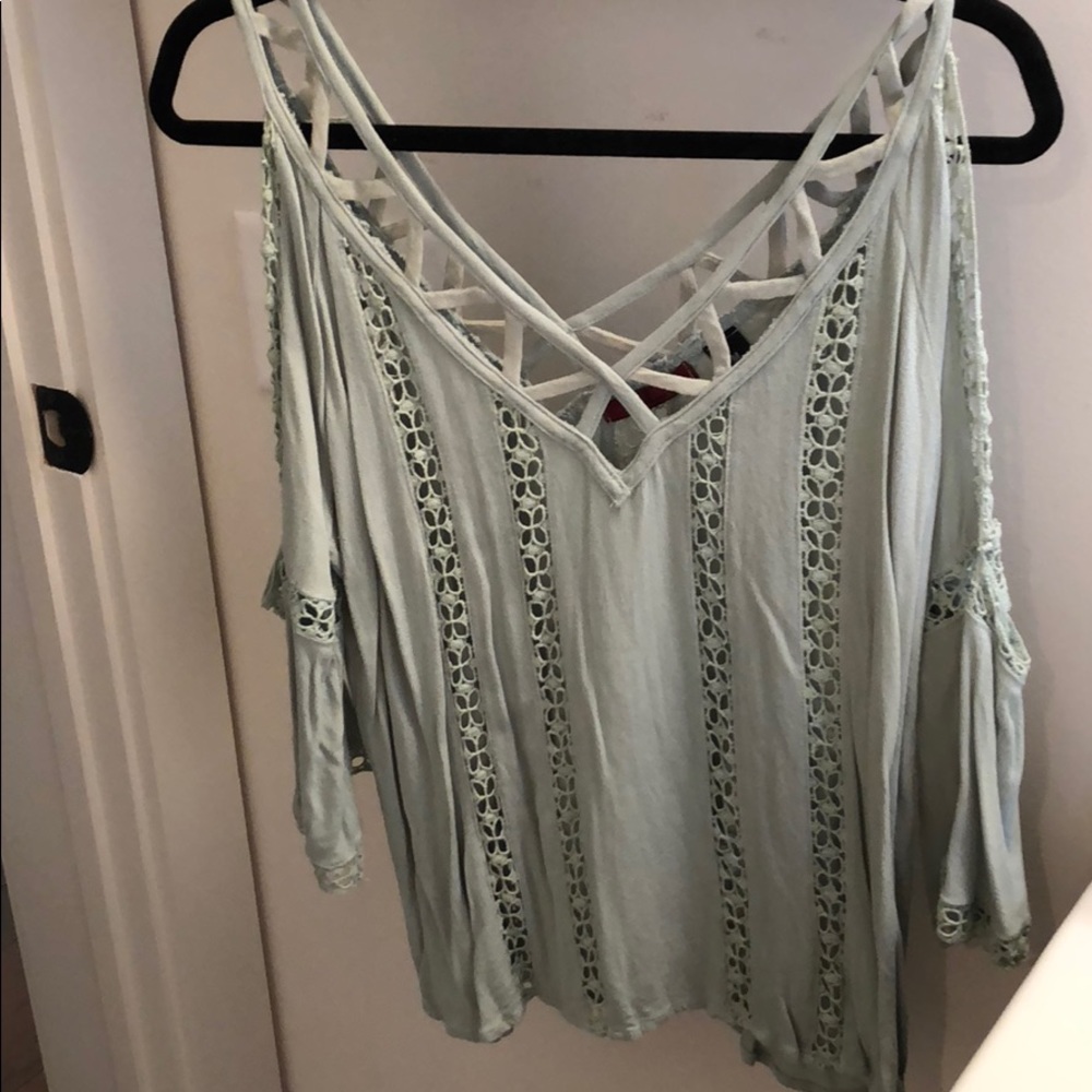 Green cut out shirt